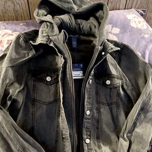 Distressed black jean jacket combo.